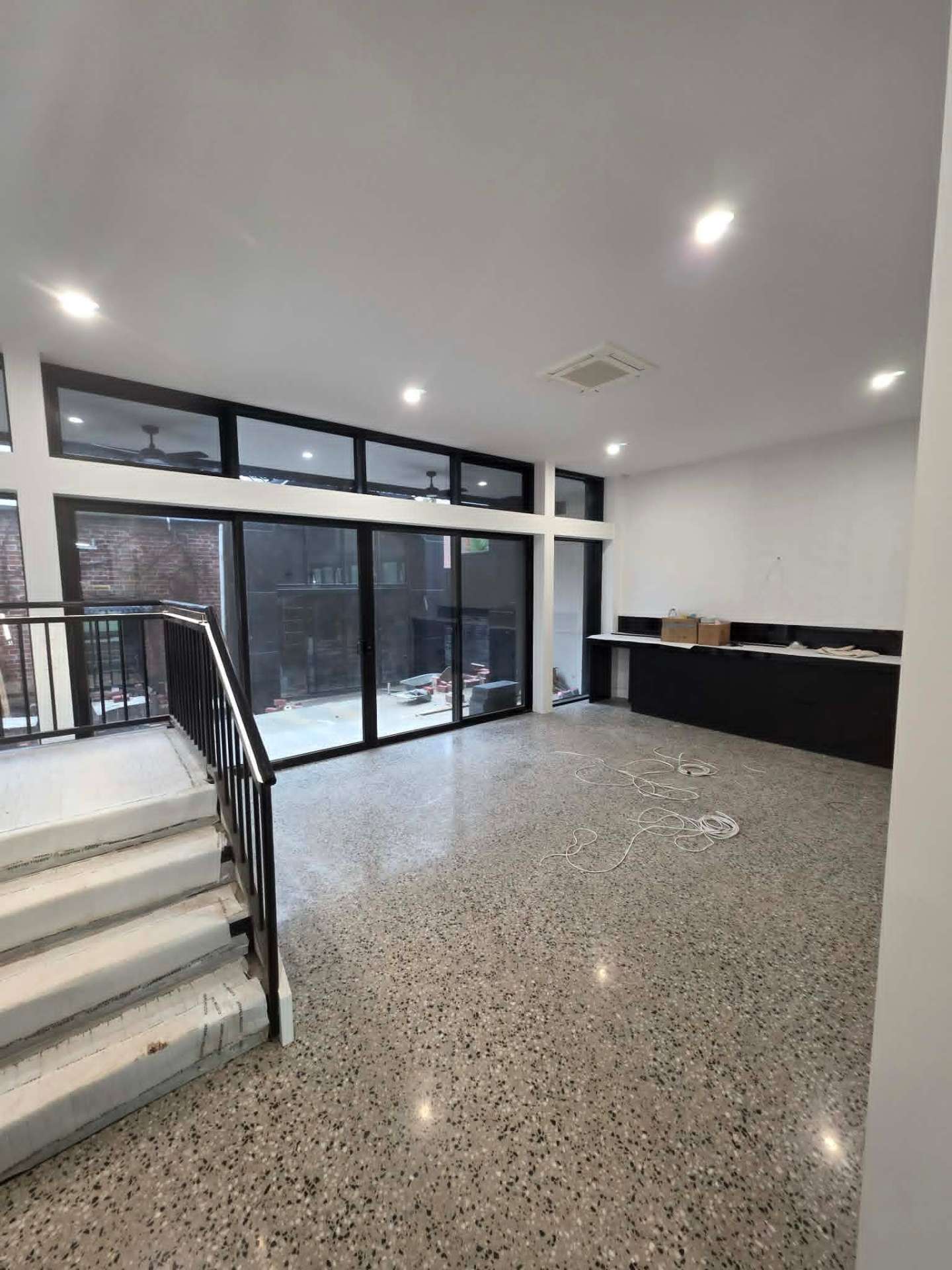 Flush plastered walls and ceiling in an open-plan Ballarat living area