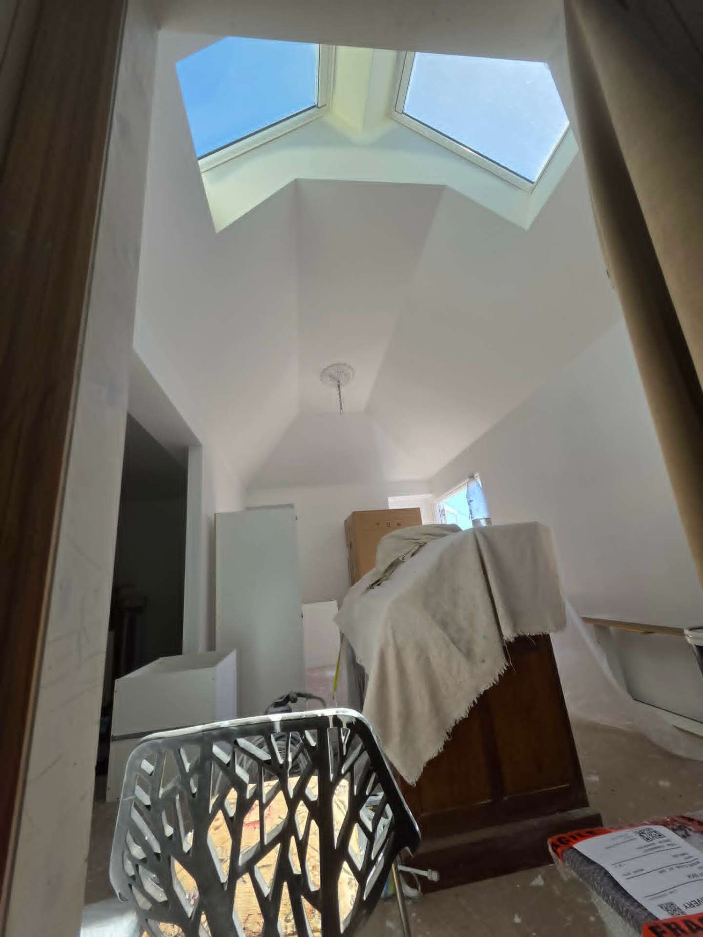 Square-set raked ceiling with skylight in a Ballarat home